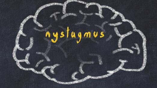 Drawind of human brain on chalkboard with inscription nystagmus