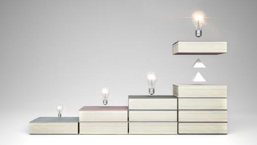 Staircase made of books, education concept, learning, improvement and progress through education, development of ideas, blank white background with copy space